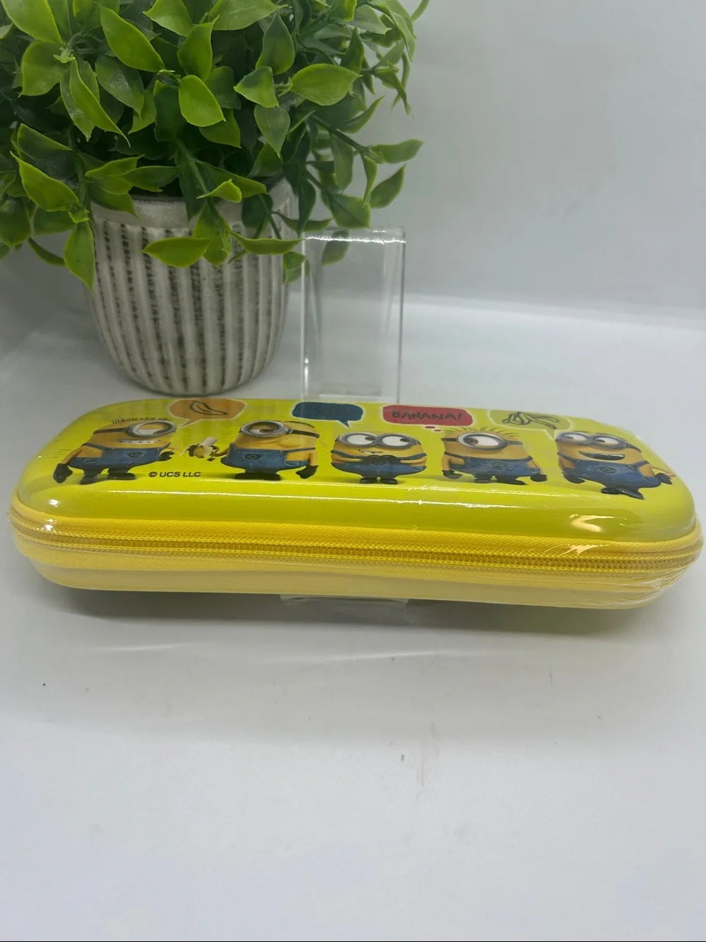 Yellow Minions character zippered pencil case graphics of various Minions.NWT